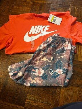 Nike Gray Floral Swim Shorts with Teal and Coral Accents